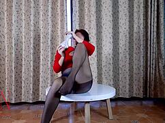 i watch this nice lady in pantyhose and heels do a striptease at the round table, she's a whore undressing on the desk with clothes ripped