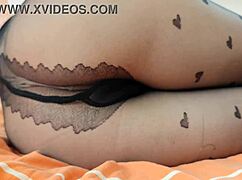 Teen explores self-pleasure in pantyhose, reaching climax. DepravedMinx