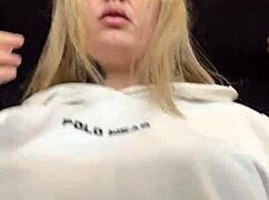 crossdresser gets horny in gym with see-through shirt showing hard nipples