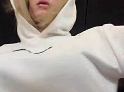 crossdresser gets horny in gym with see-through shirt showing hard nipples