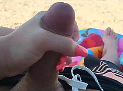 getting him off on public beach subtly