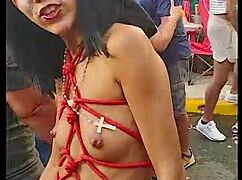 Hairy babe dances with nip slips and upskirt flashes in public street