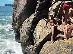 that sneaky fisherman got caught giving ass behind the rocks, full scene