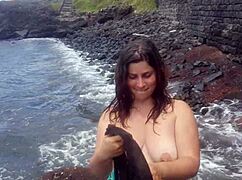 Stepmom Seduces with Huge Ass on Public Beach