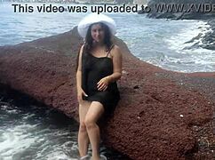 Stepmom Seduces with Huge Ass on Public Beach