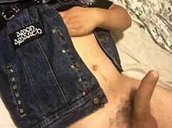 Muscular gay bodybuilder intensely jerks his cock