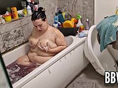 creepy guy spies on bbw milf washing huge tits in bath