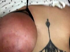 Gentle interaction with tits involving light spanking.