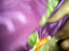 This aunty strokes her boyfriend's cock in homemade video.