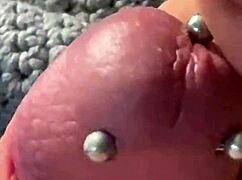 BDSM man with big piercing shoots first cumshot. The news reveals his intense solo session.