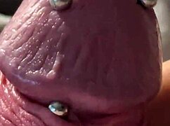 BDSM man with big piercing shoots first cumshot. The news reveals his intense solo session.