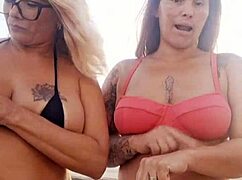 Talking Dirty on Beach with Naughty Friend Before Fun