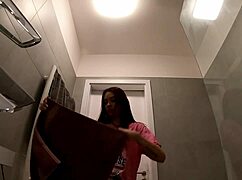 Hottest redhead strips in bathroom, removing t-shirt and panties to reveal tight ass and pussy
