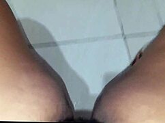 look at that fat slut touching her pussy in the church bathroom