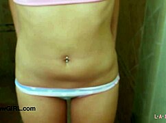 Pretty blonde model takes shower