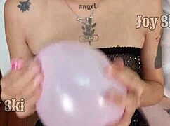 Prima celebrates birthday with cousin rubbing balloons at party