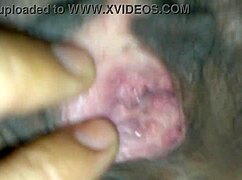 This hot amateur girl enjoys a huge orgasm, her shaved pussy dripping wet.