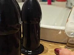 large sextoy stretches redhead's ass wide open