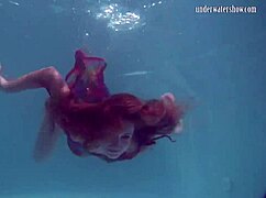 why does redhead b nikita vodorezova get naked so fast underwater on the public beach
