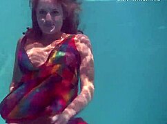 why does redhead b nikita vodorezova get naked so fast underwater on the public beach