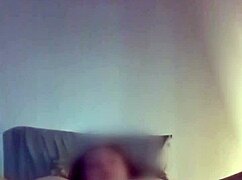 Casual homemade video shot vertically in bed