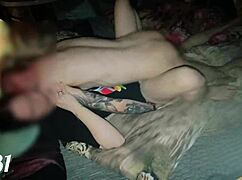 couple has sex on squeaky illuminated hotel bed, moaning during orgasm and cunilingus