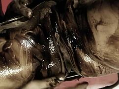 a naughty brunette and her man play with dark oil and fuck doggy style 😈