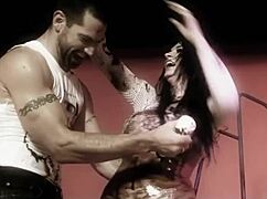 a naughty brunette and her man play with dark oil and fuck doggy style 😈