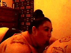 Carlee, the BBW, gives a blowjob.