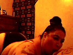 Carlee, the BBW, gives a blowjob.