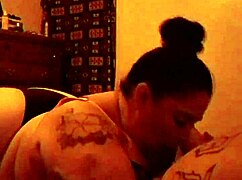 Carlee, the BBW, gives a blowjob.