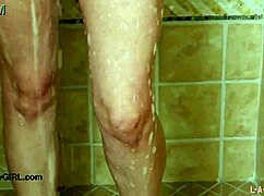 enchanting brunette beauty showers in steamy solo action!