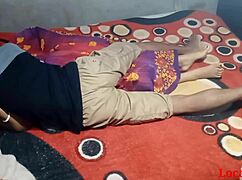 Intriguing red saree worn by indian bengali wife in official video