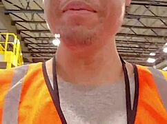 an asian woman casually walking around outdoors during her work shift