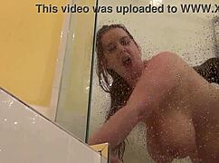 Redhead rides big black cock intensely in shower