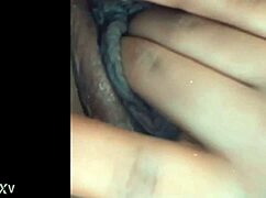 She rubs her pussy while fingering big ass and cock