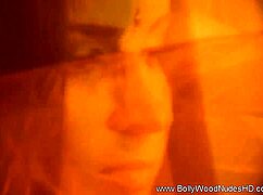 check out this naked brunette striptease, beautiful oriental girl teasing with ripped clothes and exotic music