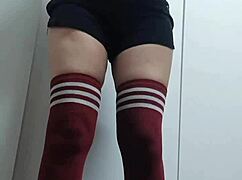 cheeky chick tries on tops topless in change room without panties