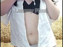 Horny brunette stripteases