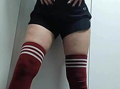 cheeky chick tries on tops topless in change room without panties