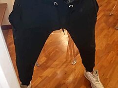 The guy with huge cock plays on transparent chair, showing his ass and dick in close-up