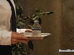 The hot lesbian madame in lingerie moans as she orgasms with her slave