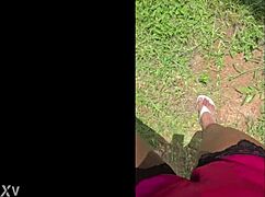 Tall Woman Stomps in the Garden, Making Everything Look Small from Up Here