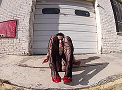 Thong bodysuit walking the docks