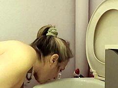 What does the housewife slave do in the toilet?