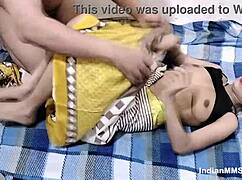 Real couple engages in passionate late night Indian sex. Bent over with natural tits on display.