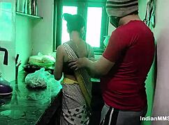Real couple engages in passionate late night Indian sex. Bent over with natural tits on display.