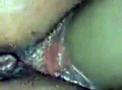 Muscular ebony babe achieves orgasm playing with big wet pussy lips using dildo