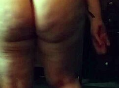 The brunette with a big sexy ass performs an enticing booty drop in the scene.