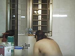 Hidden Voyeur Spies On Bathing Indian Woman